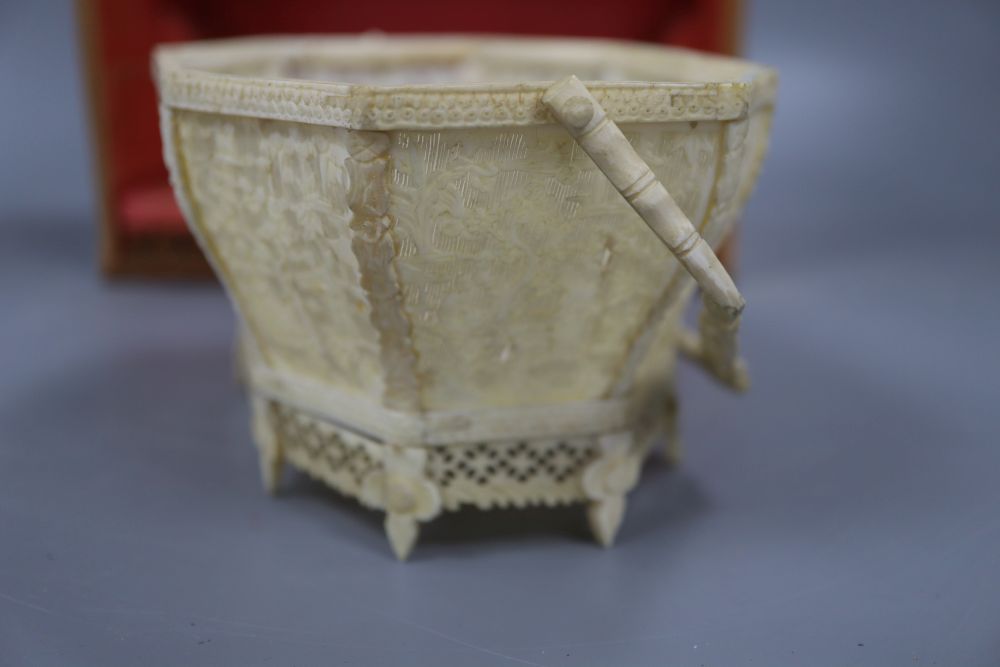 A Chinese ivory basket, boxed, width 11cm height 8cm